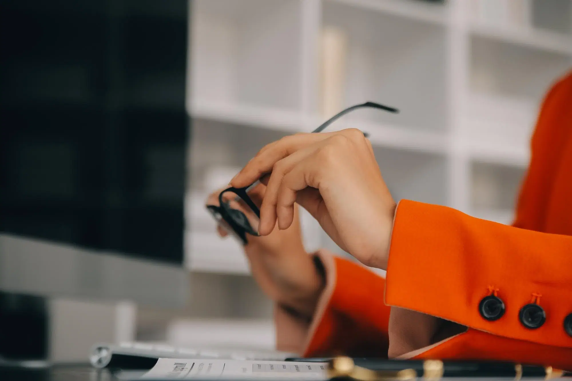 Team member in a professional office setting representing Tickmark’s audit-focused culture