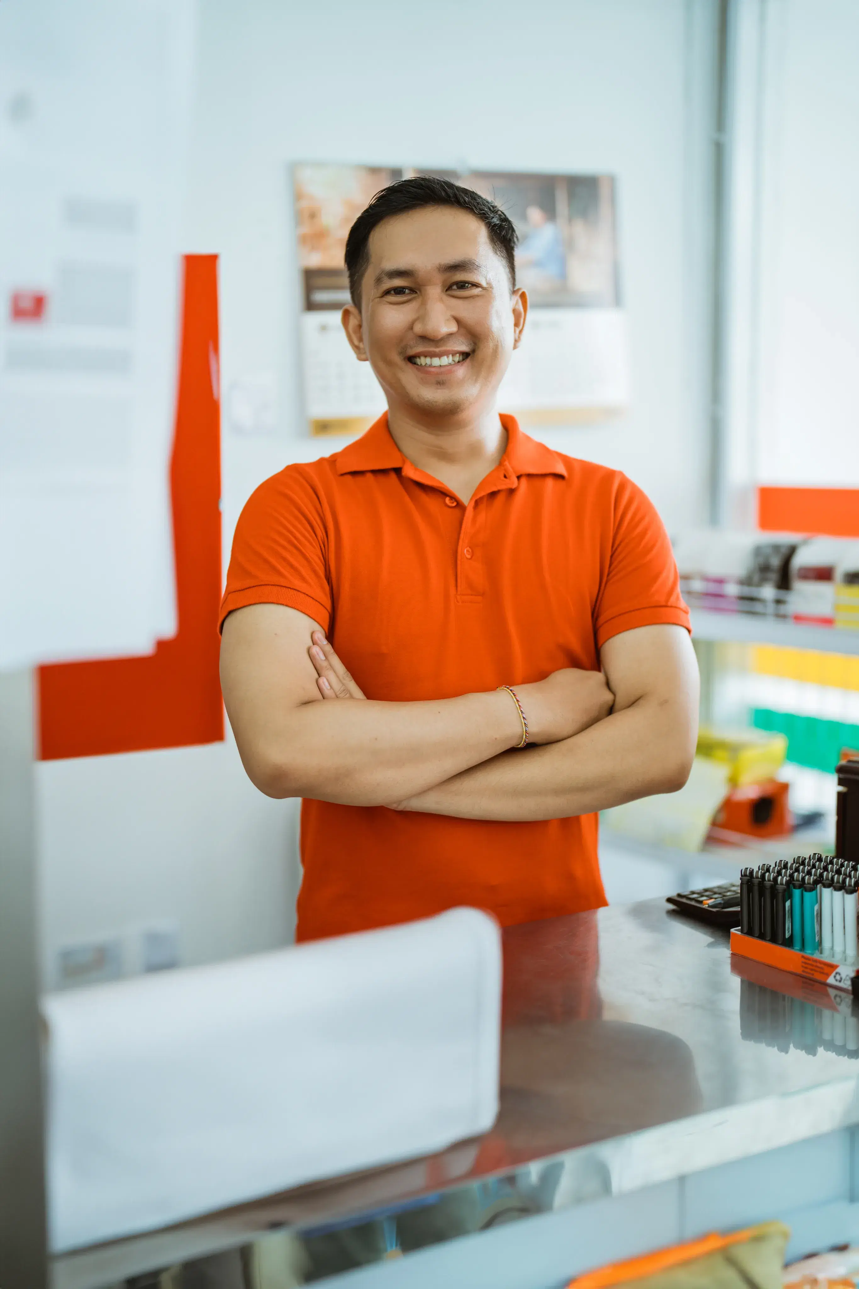 Man in orange polo